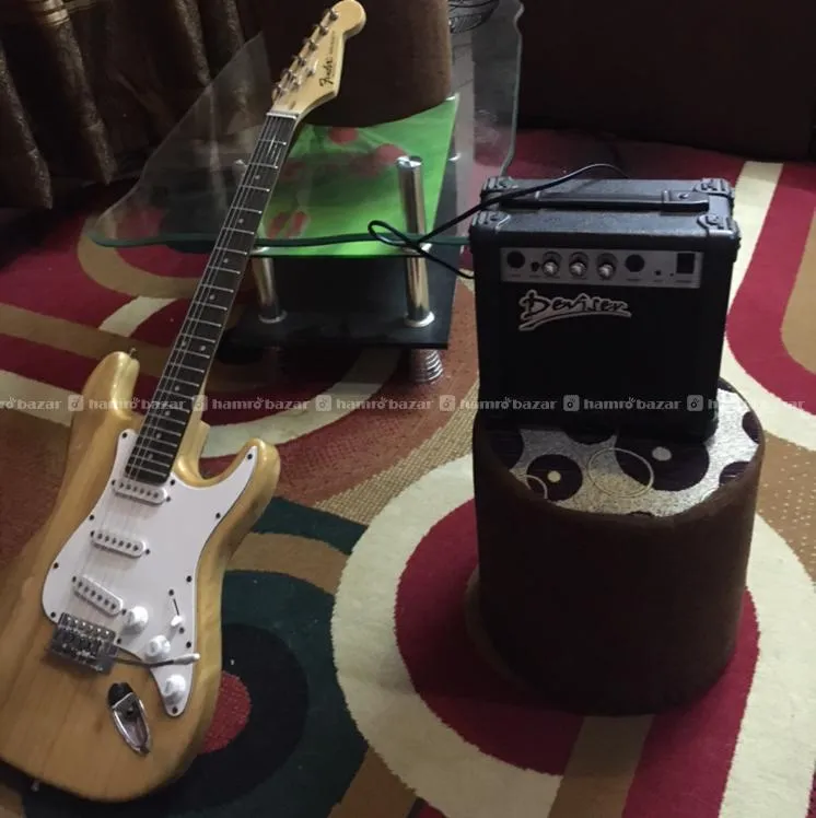 Guitar with amplifier