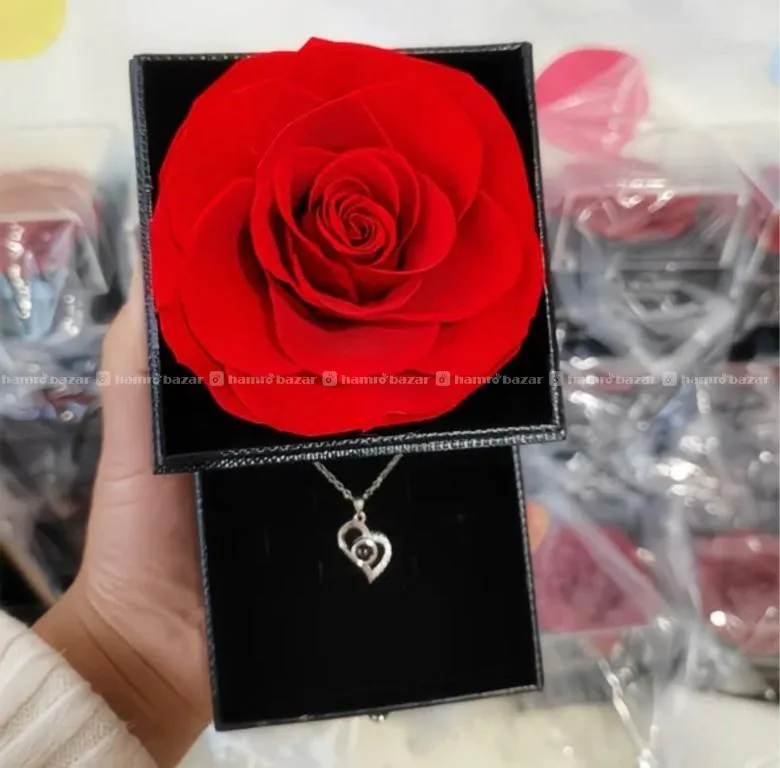 Jewelry box featuring a preserved rose. 4