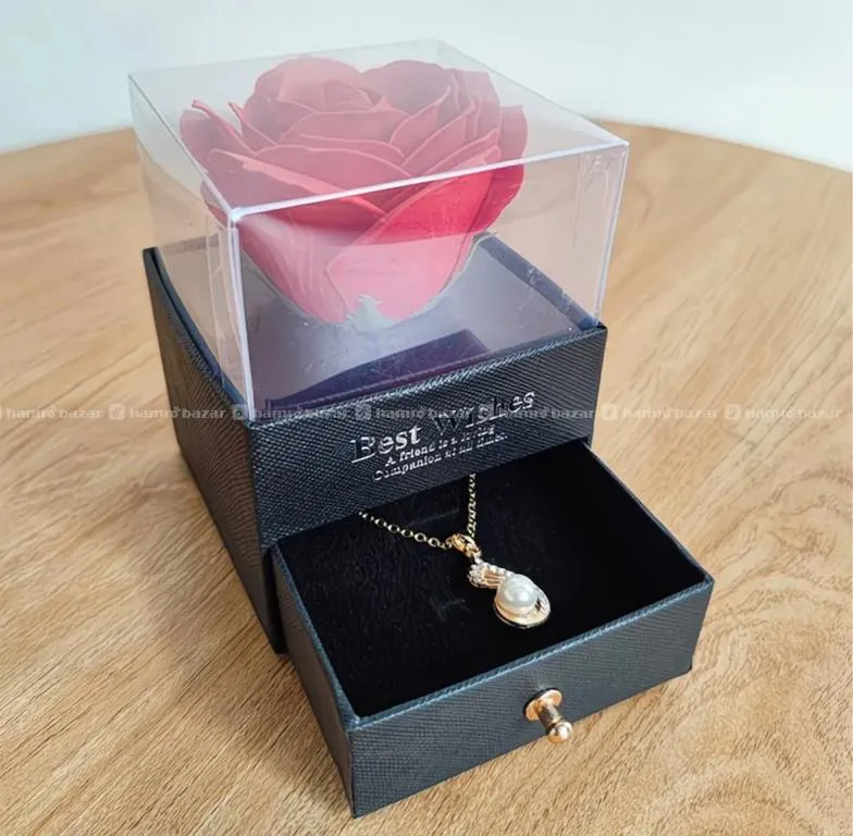 Jewelry box featuring a preserved rose. 2