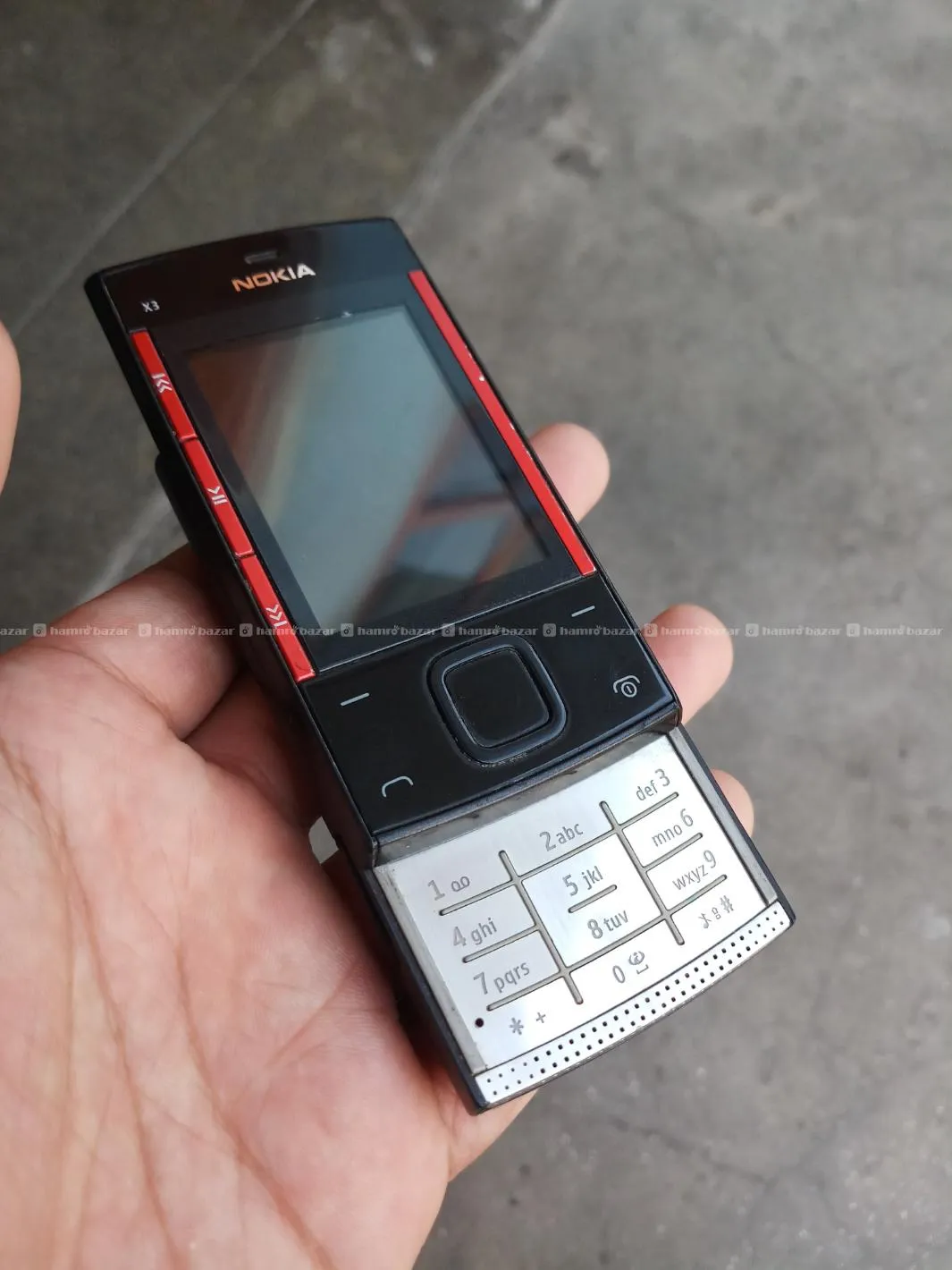 Nokia x3 00 slide 3