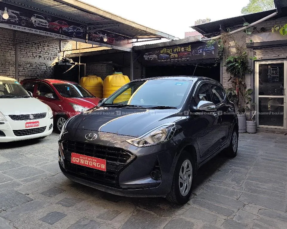 Company colour single handed Grand i10 nios Smart Auto 2021 model purchased on 2022 4