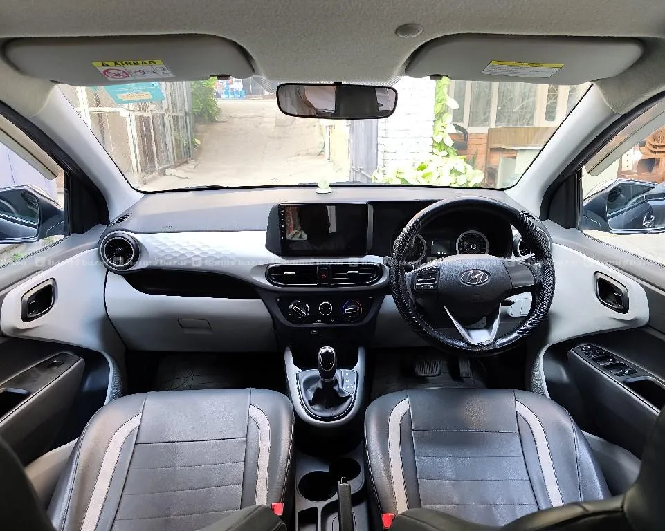 Company colour single handed Grand i10 nios Smart Auto 2021 model purchased on 2022 3