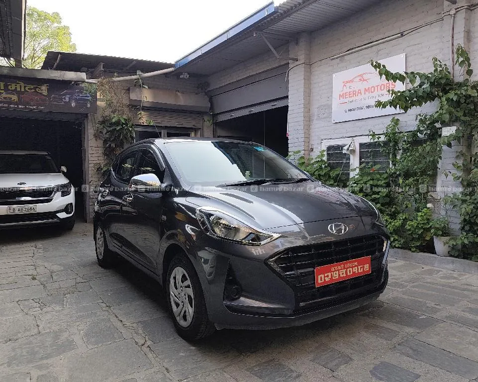 Company colour single handed Grand i10 nios Smart Auto 2021 model purchased on 2022 2