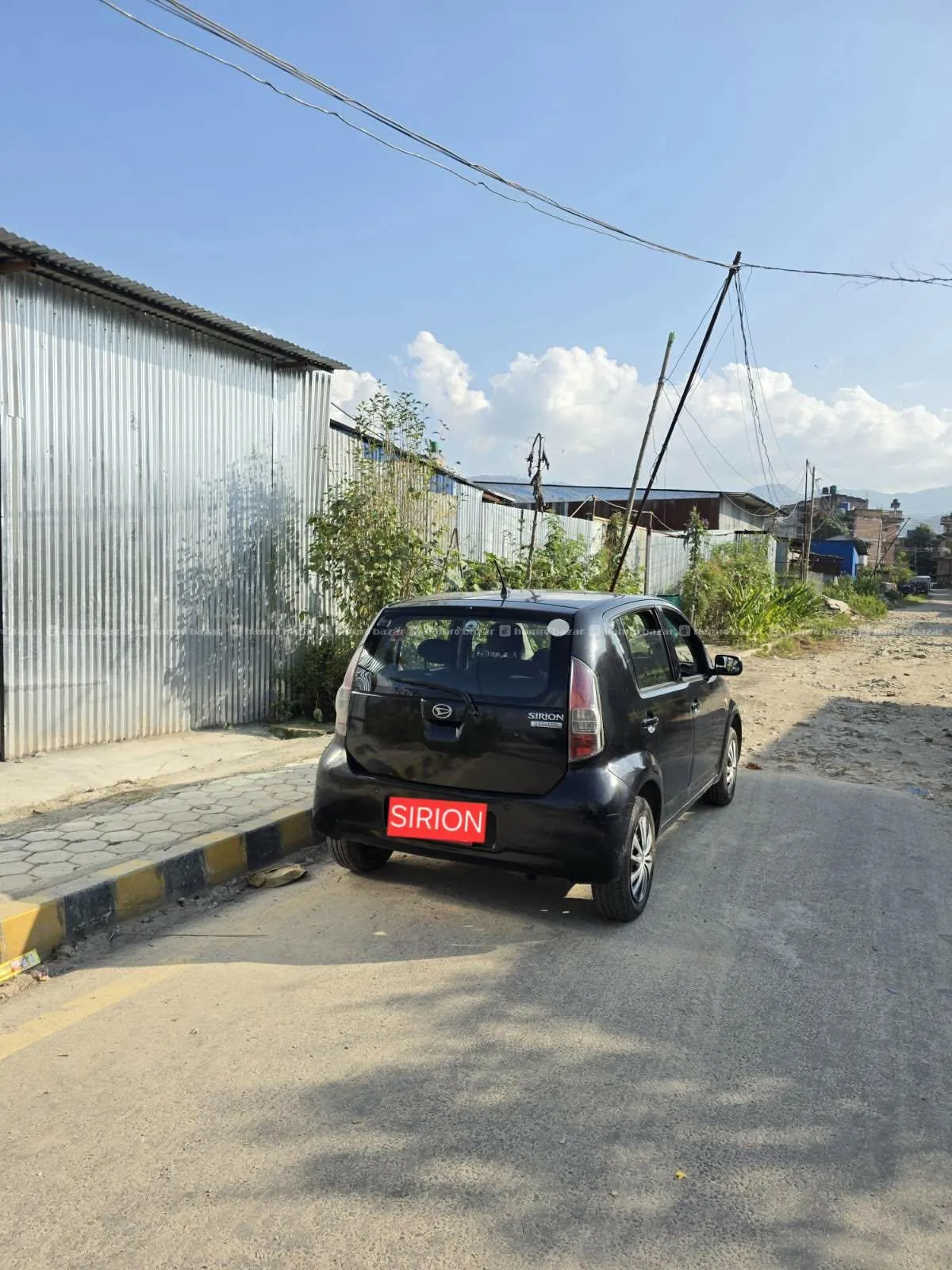 Daihatsu sirioon 2009 model 5